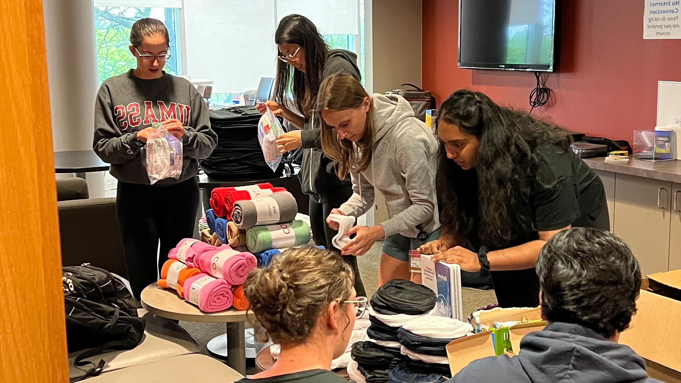 An image of students preparing care packages