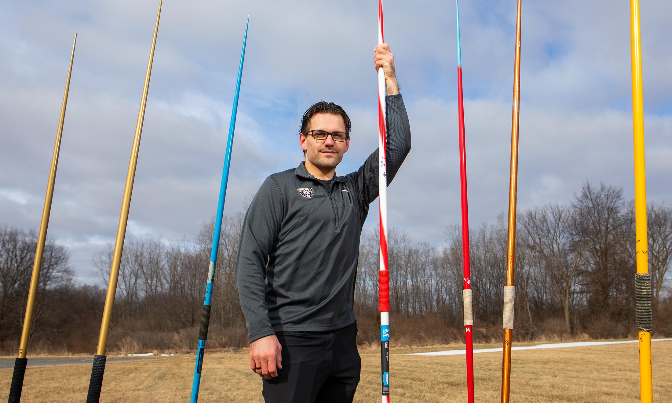 An image of Skyler Porcaro with javelins.