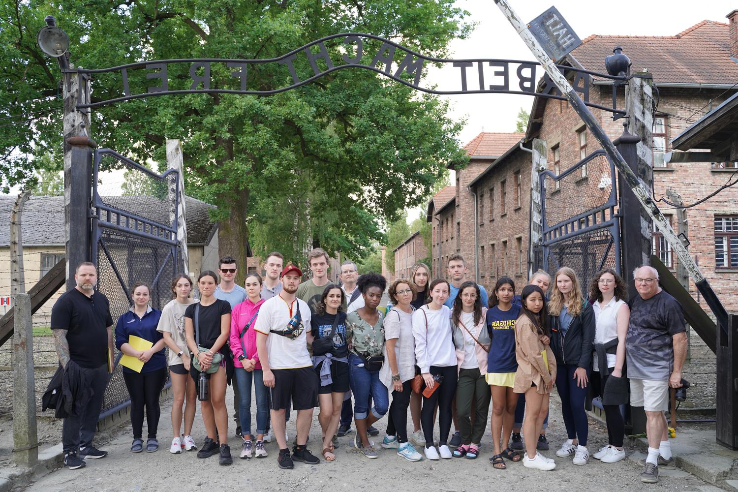 A group of students at the gate of Auschwitz 1